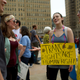 Protestors laugh during a rally against the transgender bathroom rights repeal in Philadelphia, Pennsylvania.